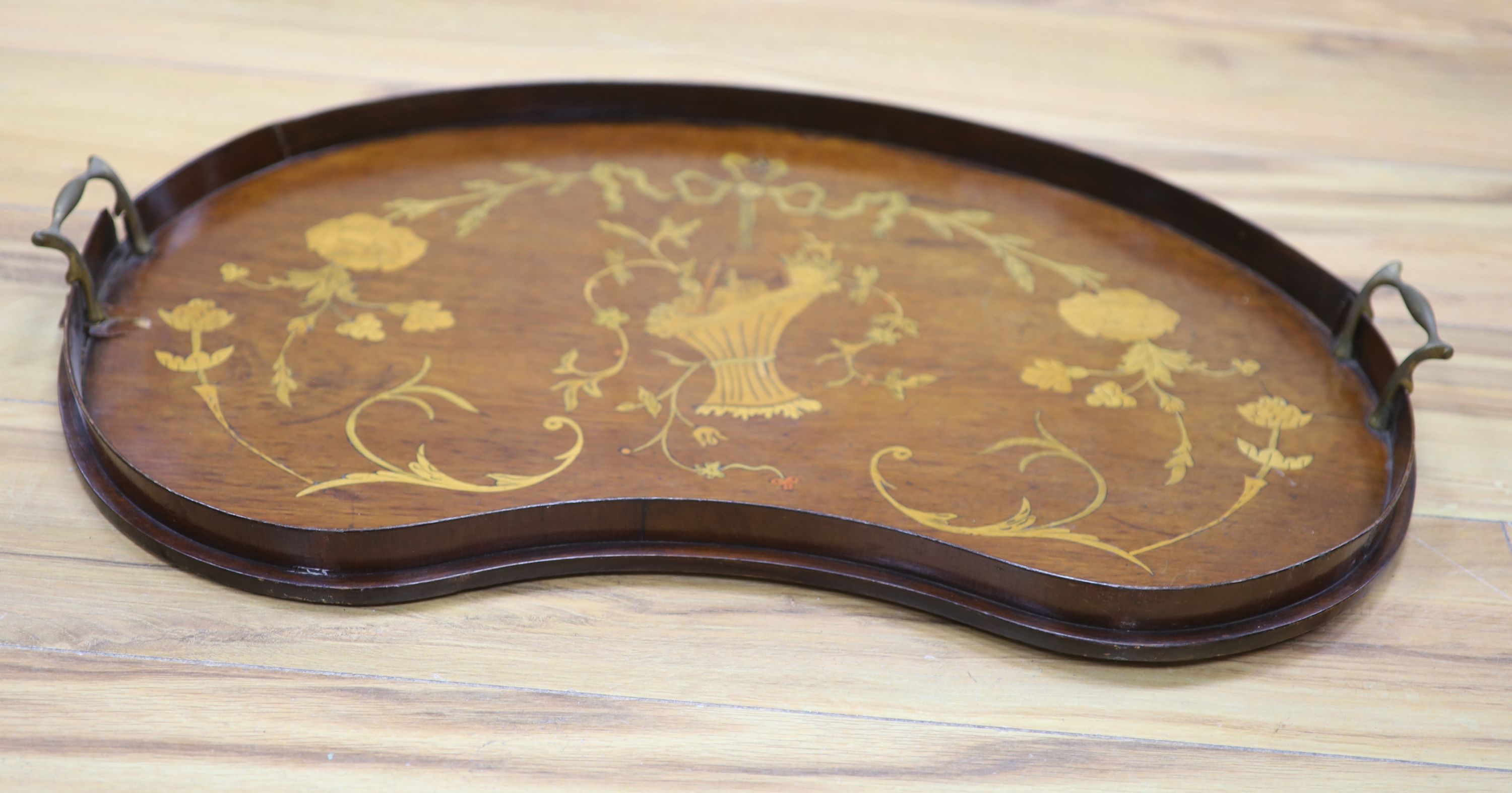 An Edwardian mahogany and marquetry inlaid two handled tea tray